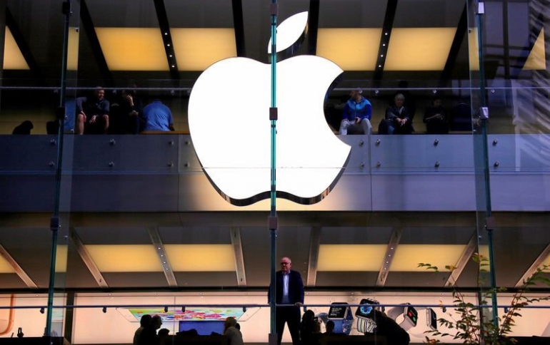 iPhone and iPad Sales Drive Apple's Revenue and Operating
Profit