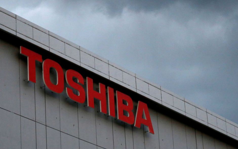Toshiba Signs Deal to Sell Chip Unit to Bain-led Group